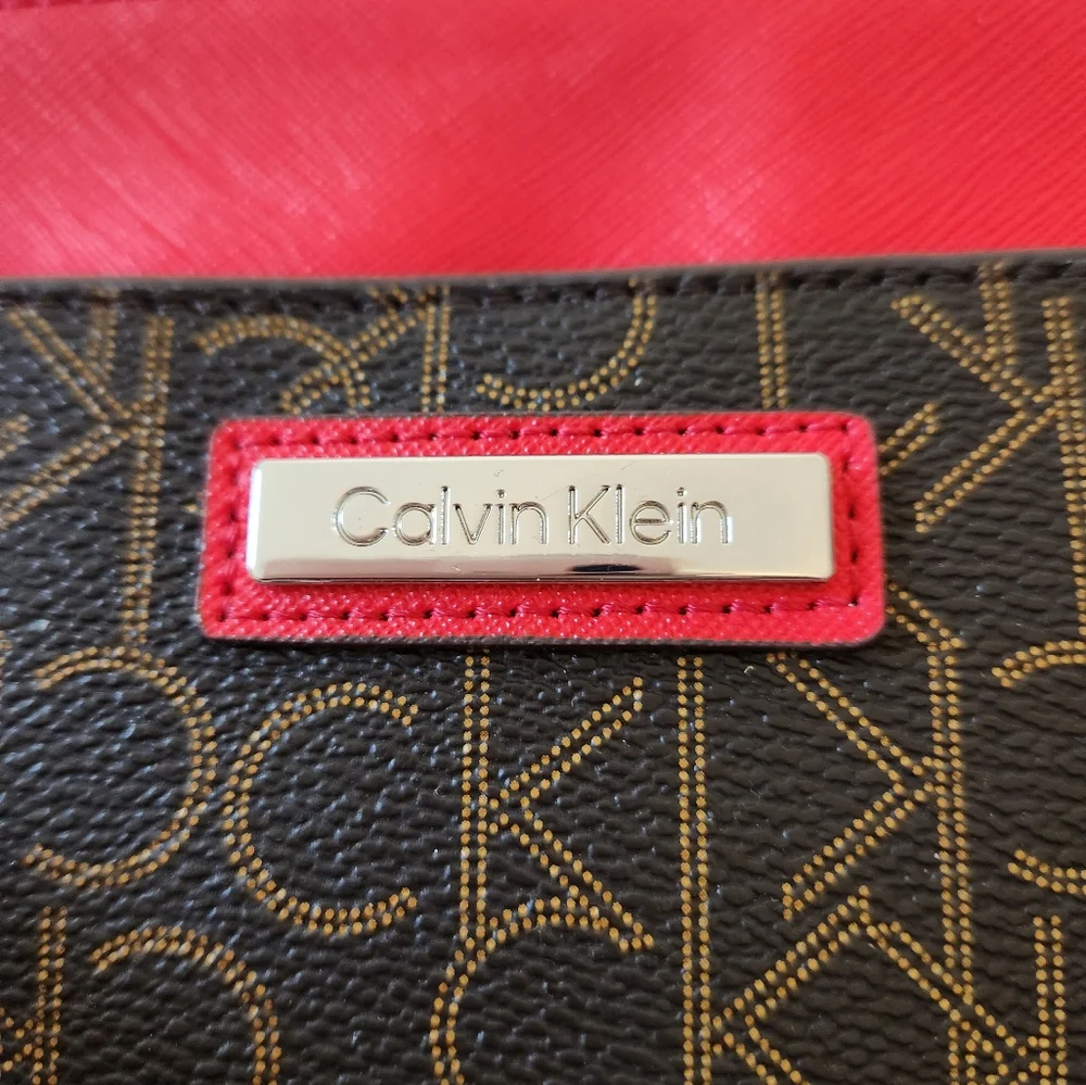 NWT CALVIN KLEIN wristlet.  GREAT COLORS.   10 X 6.5 ORIGINAL PACKING